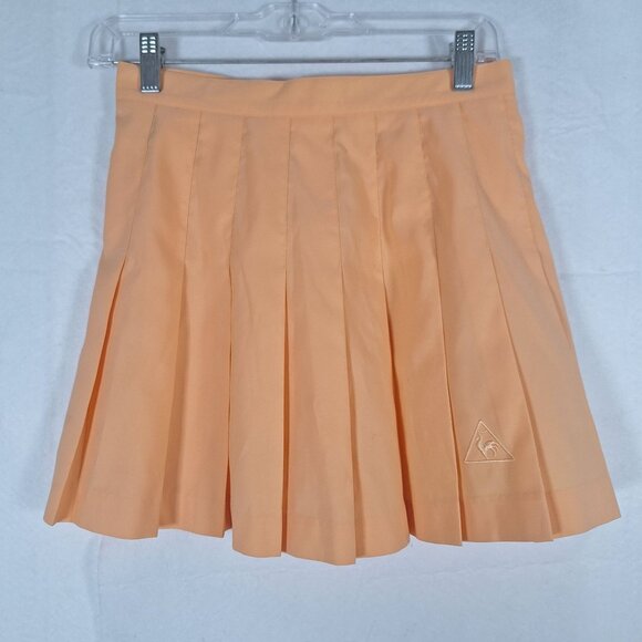 Le Coq Sportif Dresses & Skirts - vintage orange le coq sportif tennis skirt size 10